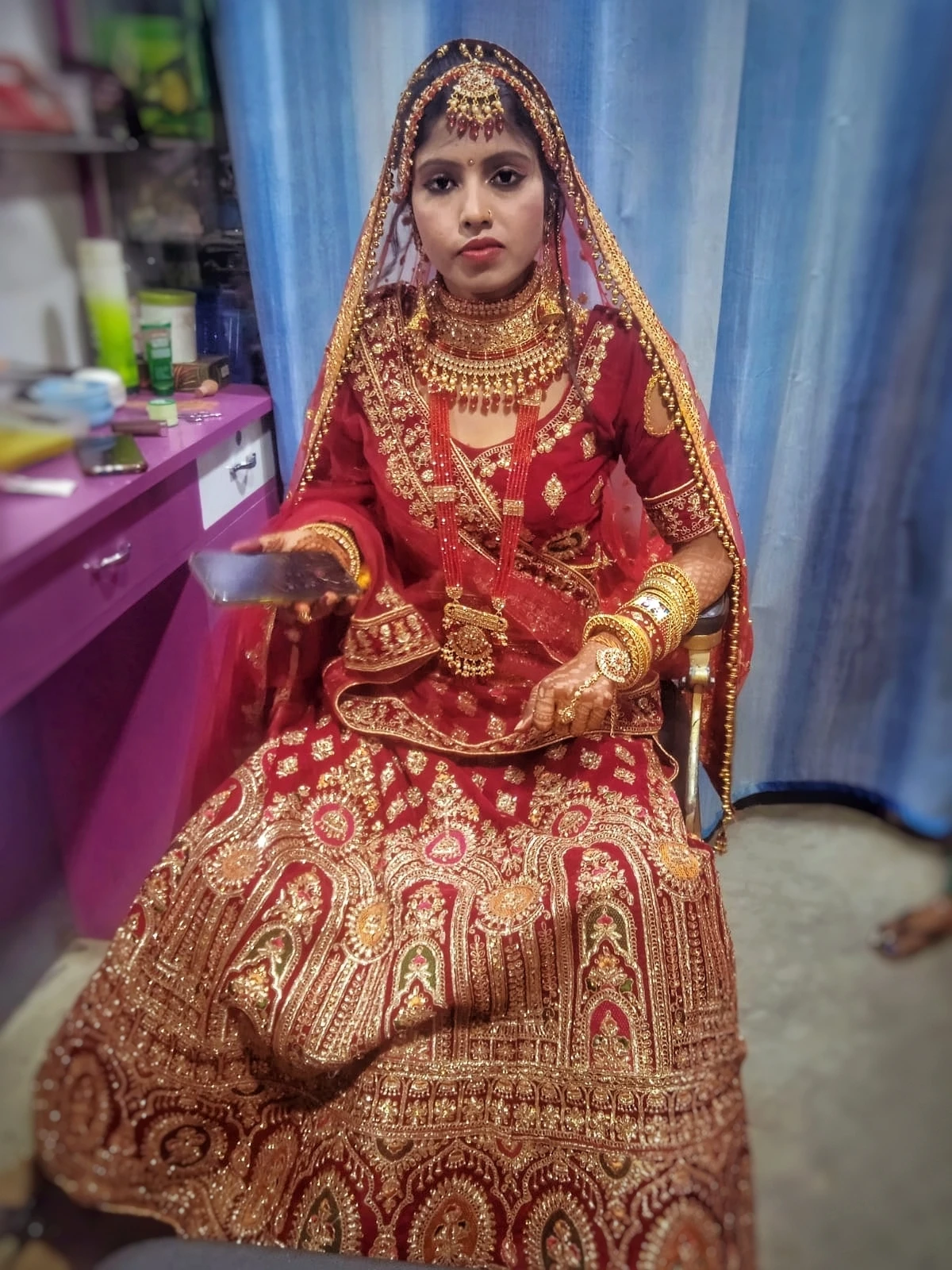 Classic red bridal makeup created at Sony Beauty Parlour, Koderma